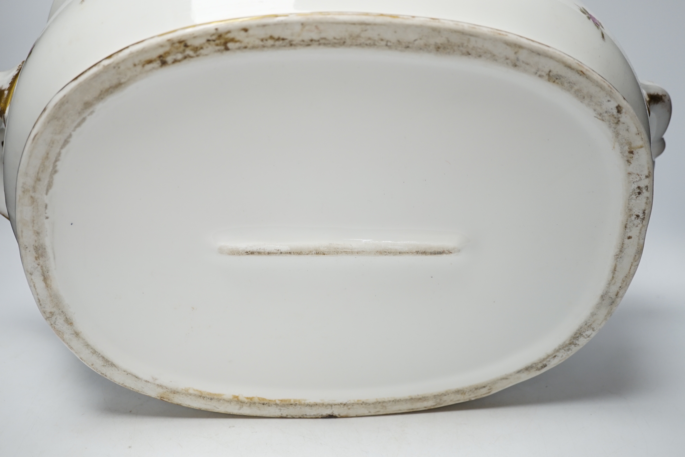 An Edwardian porcelain floral and gilt decorated foot bath, top 40cm wide not including handles
